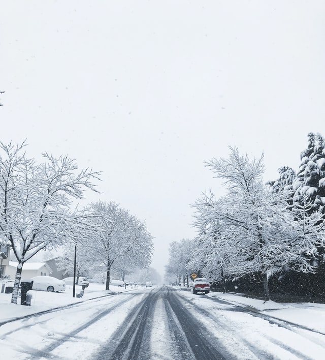 Snowy suburban road